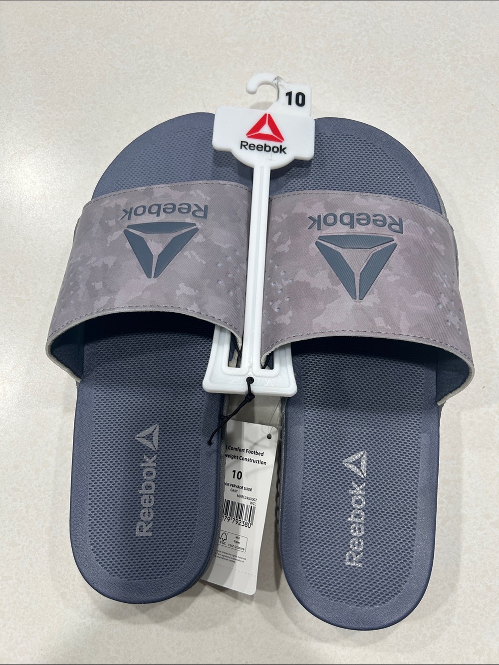 Reebok Men’s slide in flip- flops